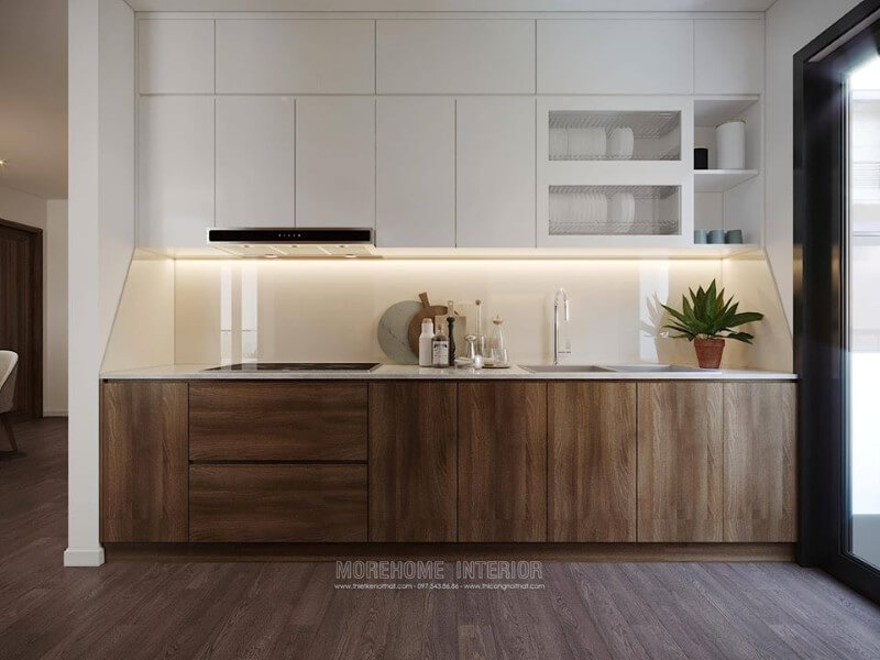 Tủ bếp dưới được làm từ gỗ công nghiệp, màu nâu trầm sang trọng, ngăn tủ cỡ lớn tạo sự thuận tiện cho việc cất, chứa đồ đạc của người nội trợ. Thiết kế phòng bếp, tủ bếp đẹp
