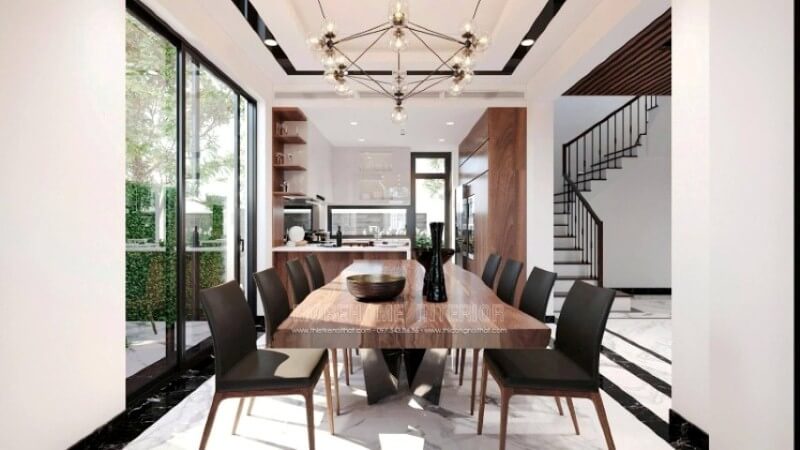 Bố trí nội thất phòng ăn sang trọng từ đồ nội thất cao cấp: bàn gỗ óc chó nguyên tấm, ghế gỗ hiện đại trên nền đá hoa cương .  Mẫu nội thất biệt thự đẹp