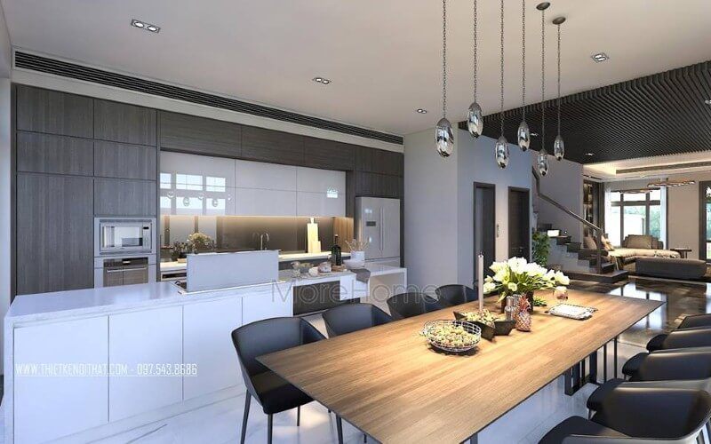 Sắp xếp nội thất phòng ăn liền bếp hiện đại, sang trọng từ tủ bếp đảo kết hợp đá ốp cao cấp cùng bộ bàn ghế ăn gỗ nguyên tấm độc đáo.