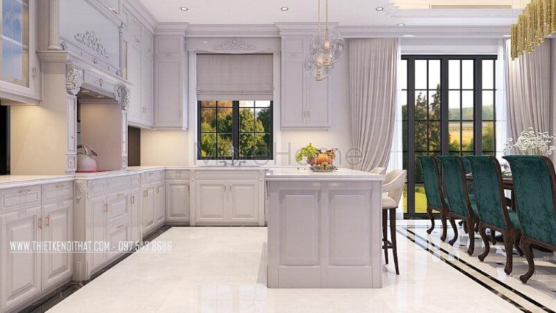 Trang trí nội thất phòng bếp gỗ tự nhiên phun sơn ấn tượng với tone màu trắng tinh khôi, không hề mang đến cảm giác nhàm chán mà thay vào đó là sự sang trọng và hào nhoáng